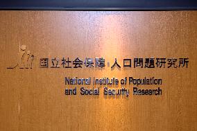 National Institute of Population and Social Security Research signboard and logo